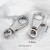 2 Silver dog hooks 