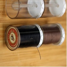 World debut thread storage case