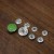 Silver with green enamel 