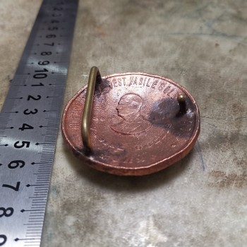 World debut - Round badge bending tool