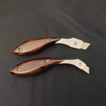 Leather blade clamp knife
