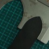 Strap tip adjuster
