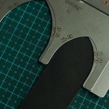 Strap tip adjuster