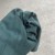 Dark grayish green 