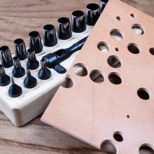 Replaceable tip puncher