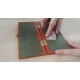 Folded leather strop with jewelers rouge